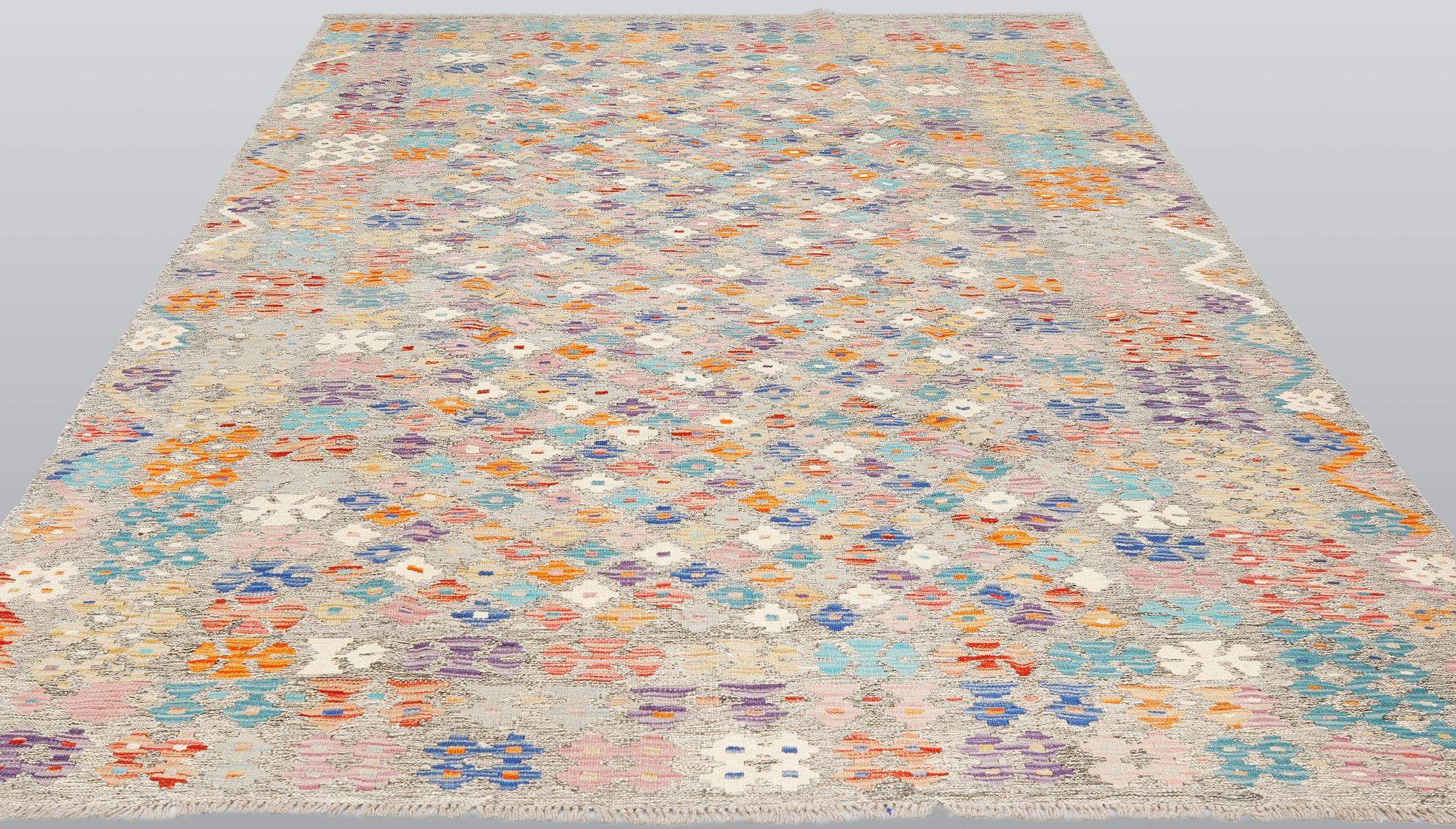 A kilim carpet, ca 290 x 206 cm.