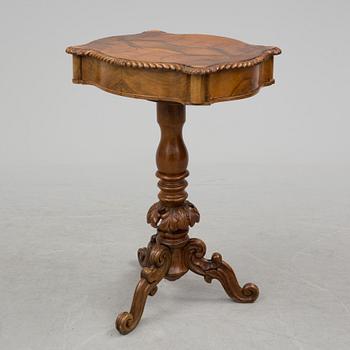A mid 19th century sewing table.