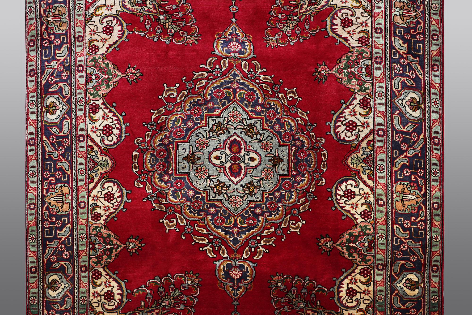 A carpet, Täbriz, 322 x 247 cm.