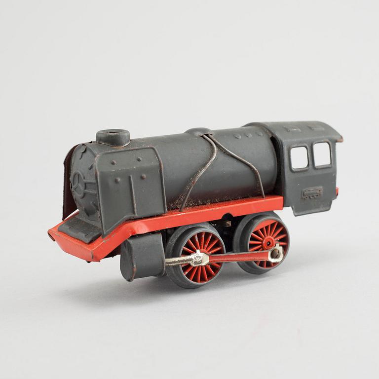 A collection of mainly Fleischmann toy trains, 12 pieces from the second half of the 20th century.