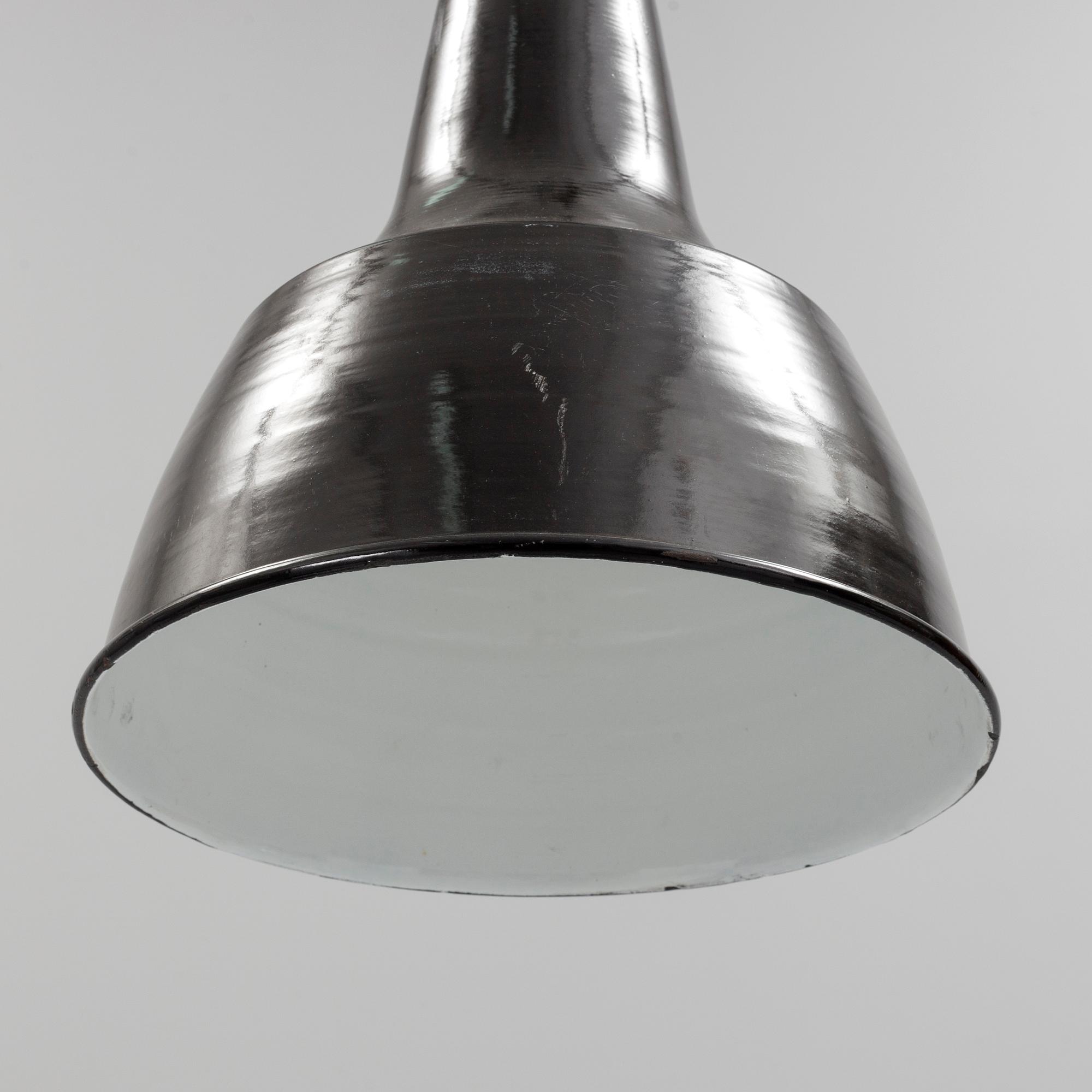 A mid 20th century metal ceiling light. Height ca 55 cm.