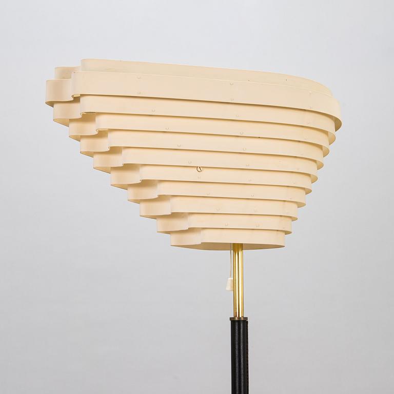 Alvar Aalto, an 'Angel's Wing' floor lamp. Manufactured by Valaistustyö.