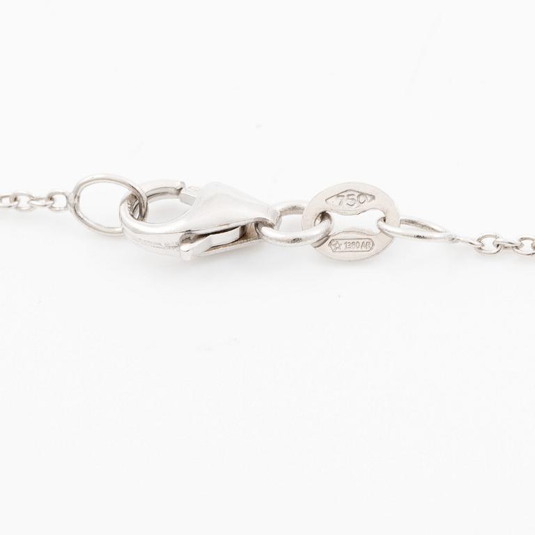 Pendant with chain in 18K white gold set with a faceted aquamarine and round brilliant-cut diamonds.