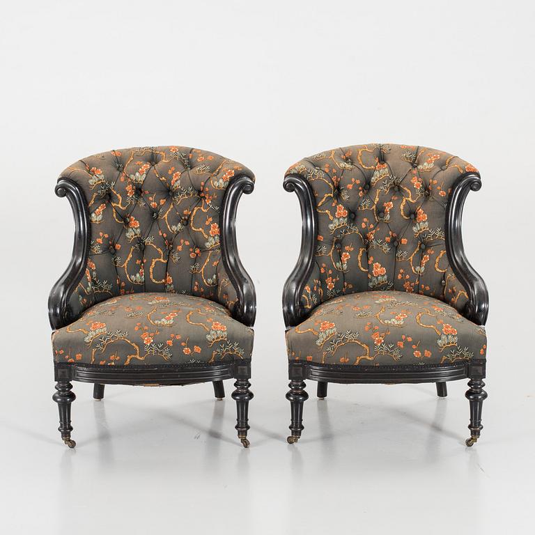 A pair of late 19th century lounge chairs.