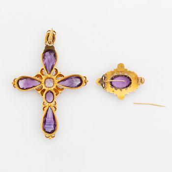 An 18K gold 19th century cross pendant and a brooch set with faceted amethysts and pearls.