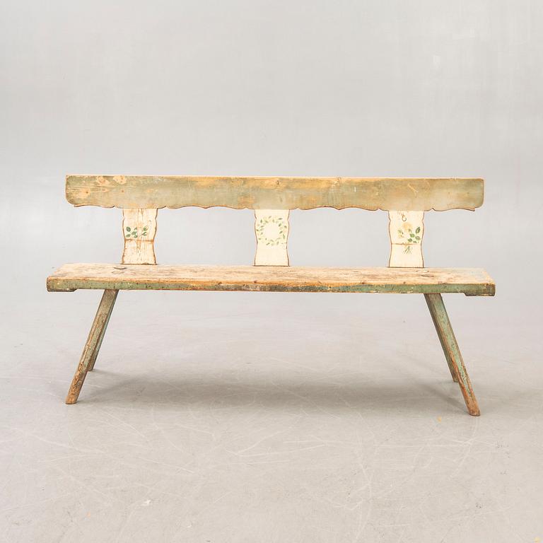 A painted early 1900s bench.