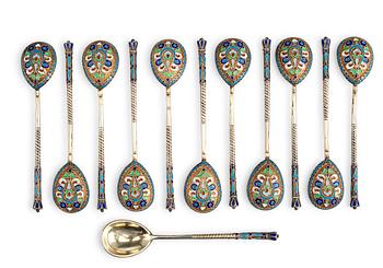 406. 12 ENAMELLED SPOONS.