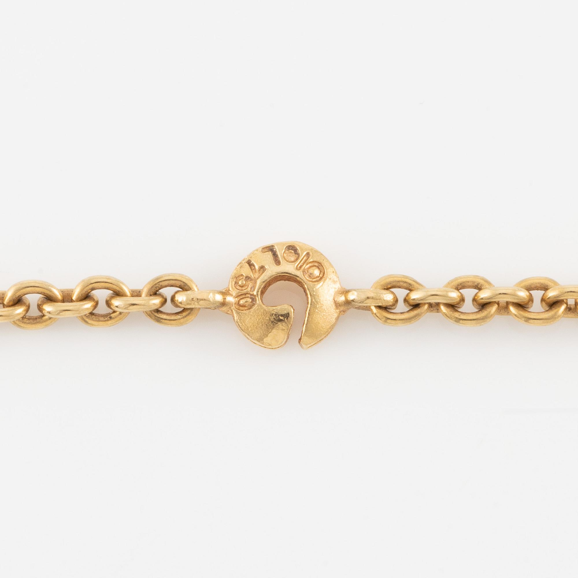 Ole Lynggaard, collier, 18K guld med dekor av blomma med briljantslipade diamanter.