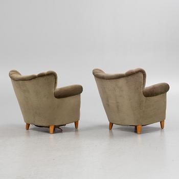 A pair of easy chairs, 1940s.