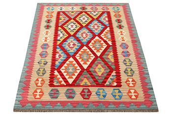 A Kilim rug, c. 179 x 132 cm.