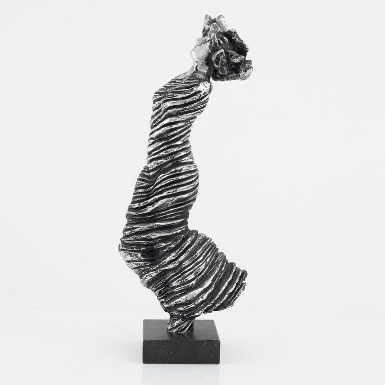 Frank Olsson, an aluminum sculpture, signed.