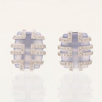 A pair of 18K white gold earrings with brilliant cut diamonds and possibly chalcedony.