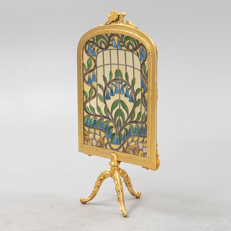 A stained glass Louis XV style fire guard, 20th Century.