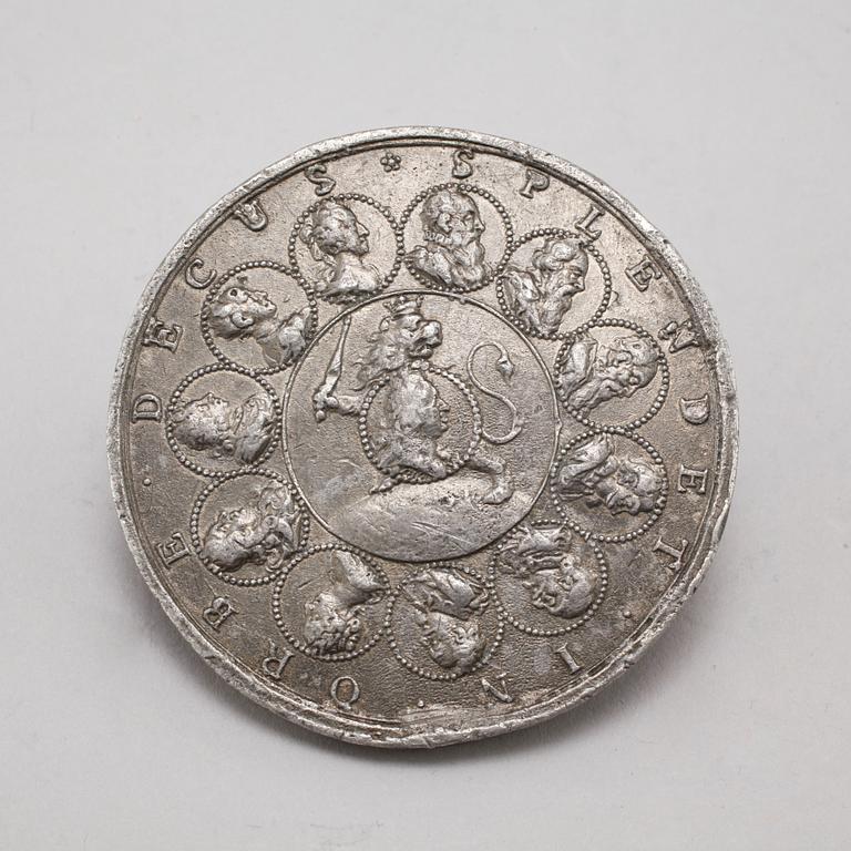 Two pewter medallions, 18th century.