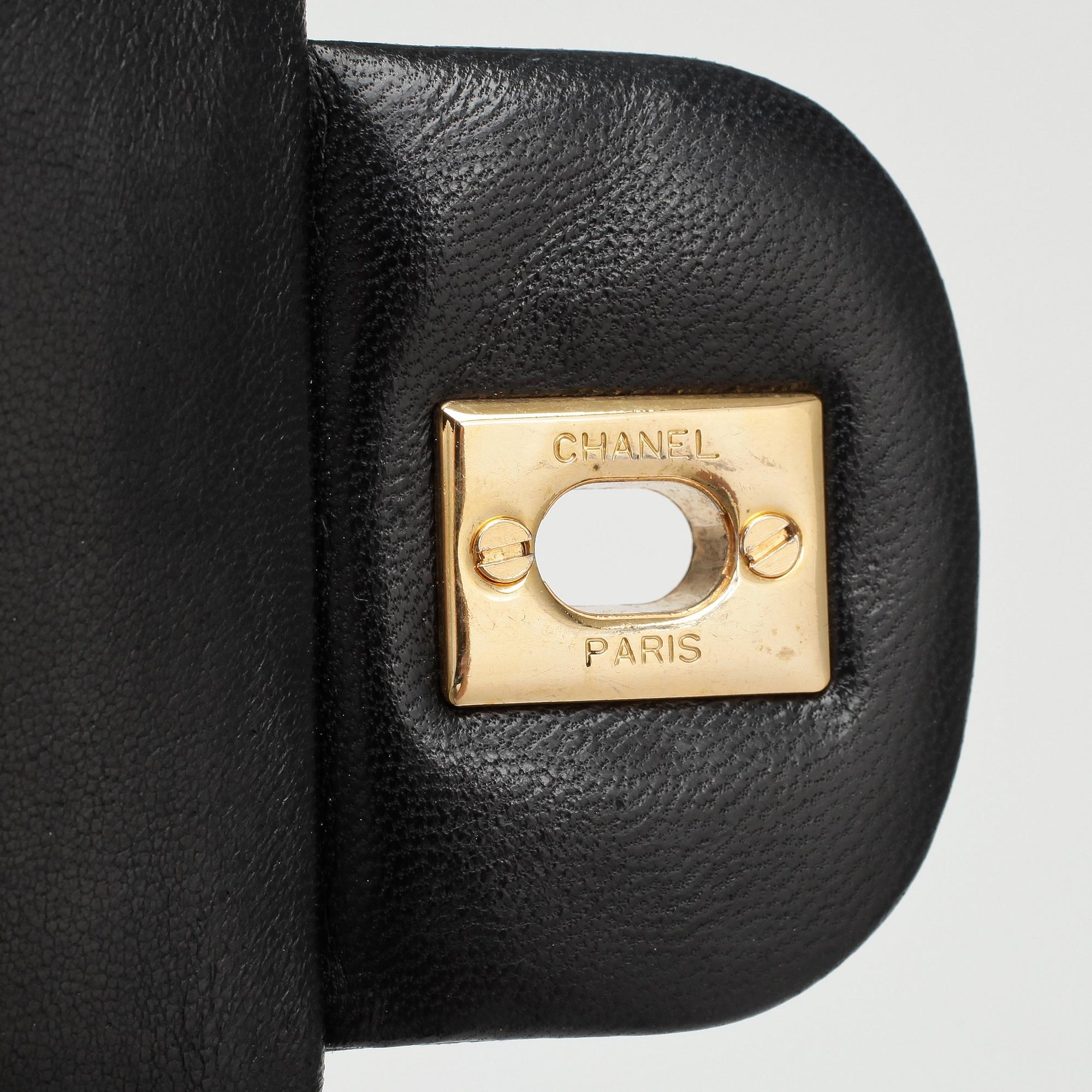 CHANEL, a quilted blue leather "Double Flap" shoulder bag.