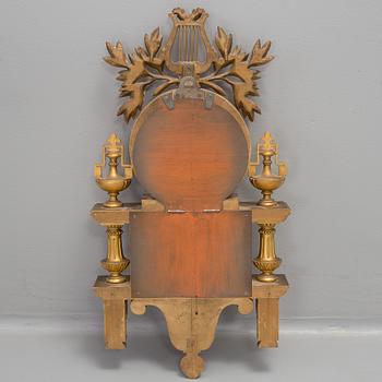 A Swedish Gustavian style gilt wood wall clock, marked Linderoth Stockholm, 20th century.