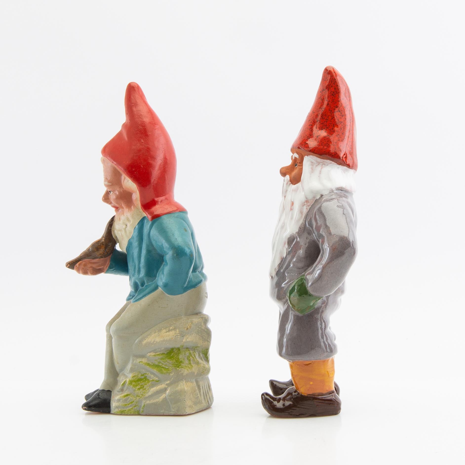 A collection of gnomes 12 pcs mid/late 20th century mostly painted terracotta.