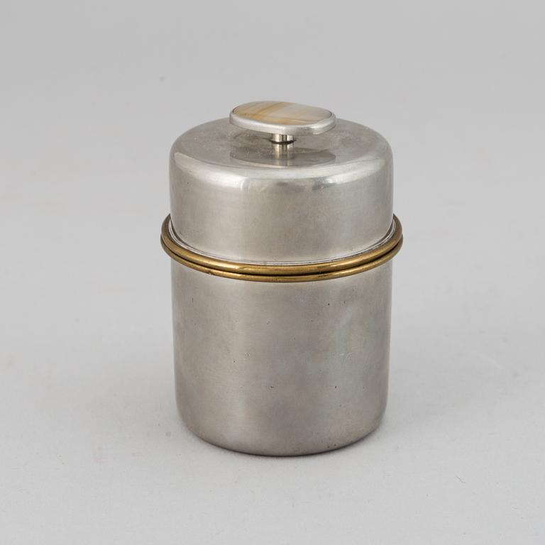 BURK MED LOCK, tenn. Svenskt Tenn, Stockholm, 1955.