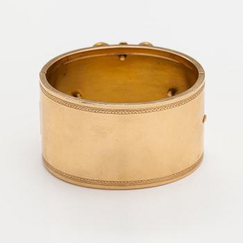 Armband, 18K guld, emalj. Olof Robert Lundgren, Åbo 1859 eller 1874.