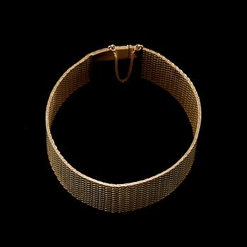 A gold bracelet.