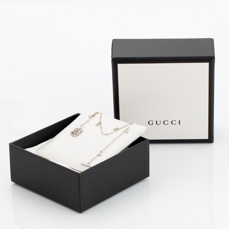 Gucci bracelet set with brilliant-cut diamonds.