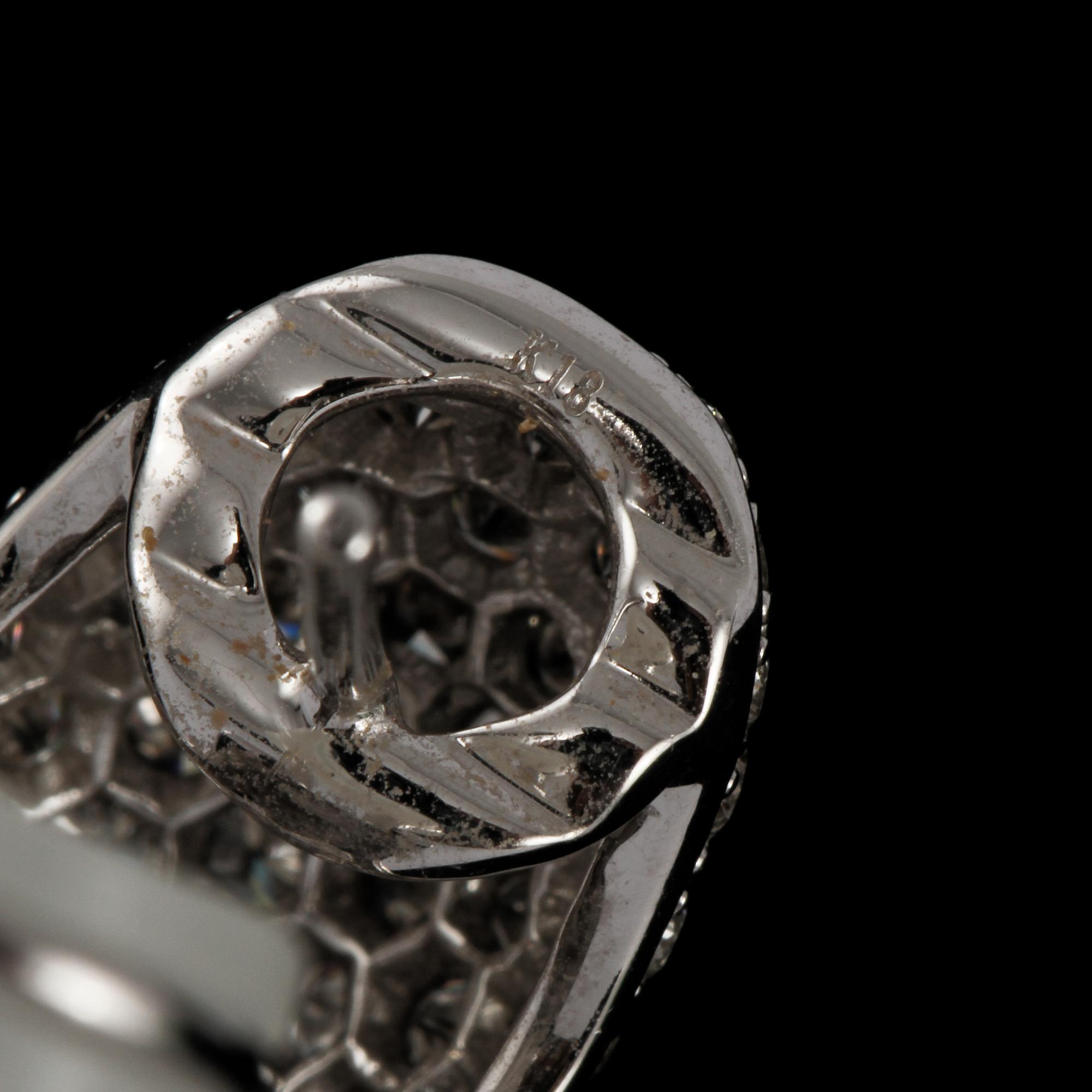 A pair of brilliant cut earrings, tot. 3.59 ct.