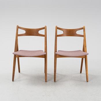 A set of six model CH 29 'Savbukstolen' by Hans J Wegner, designed 1952.