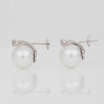 A pair of cultured South Sea pearl, Ø 14.4 mm, and diamond circa 0.50 ct in total, earrings.