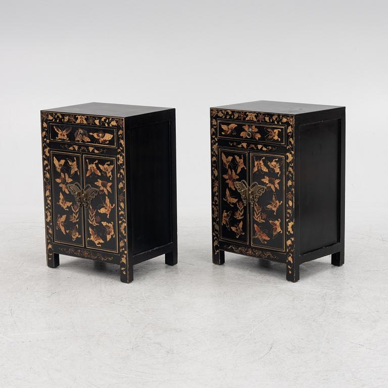 A pair of bedside tables/cabinets, China, 20th century.