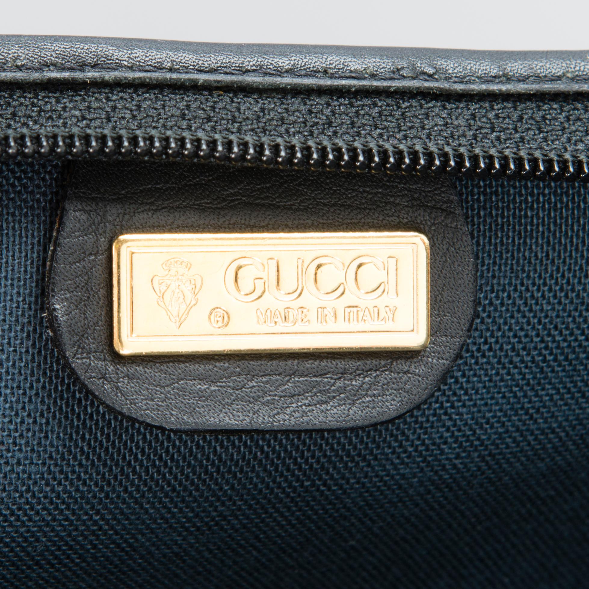 GUCCI, KLÄDÖVERDRAG SAMT VÄSKA, 1980-tal.