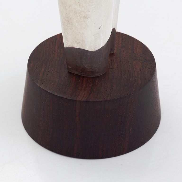 Tapio Wirkkala, a 'Liekki' (Flame) silver vase on a rosewood base, model TW 228,  Kultakeskus, Hämeenlinna 1962.