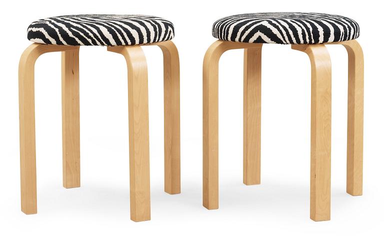 A pair of Alvar Aalto stools for Artek, Finland 2002.