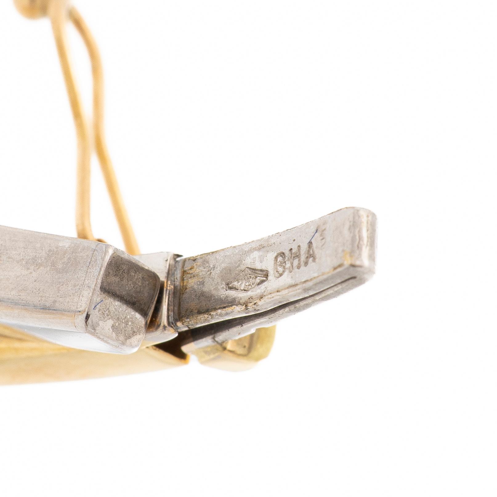 Armring 18K guld och vitguld.