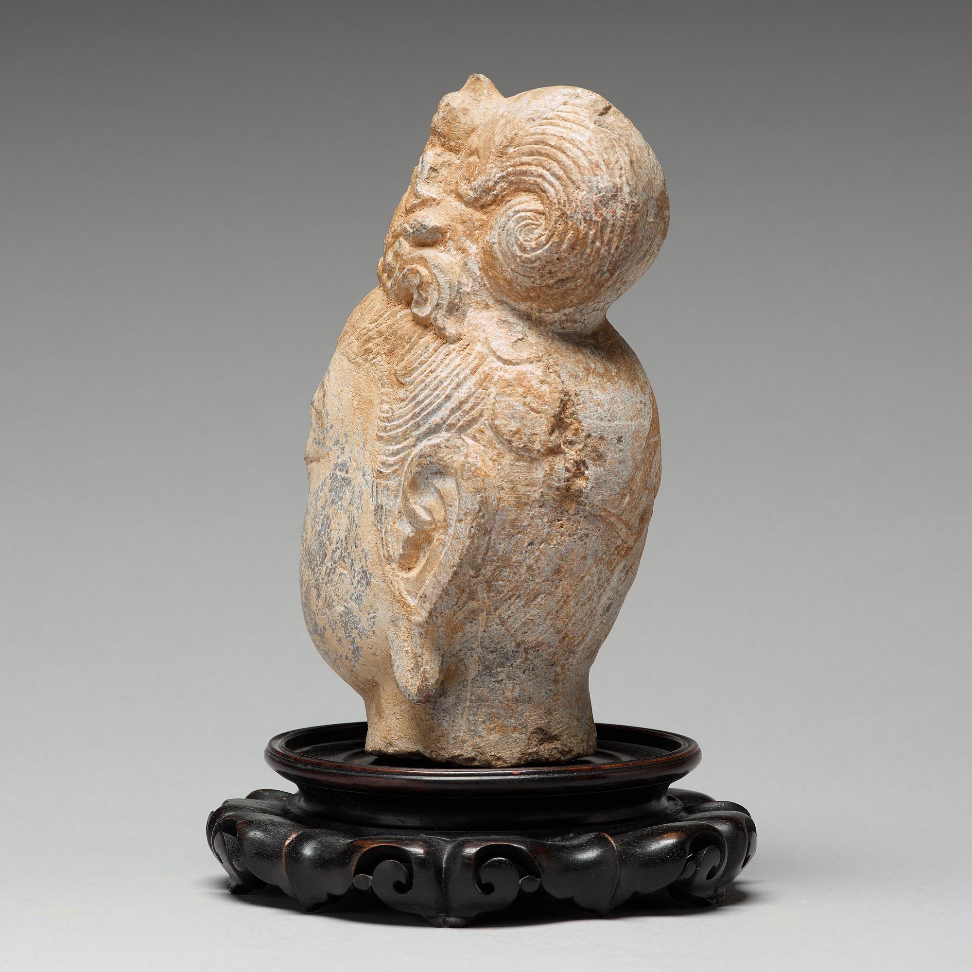 A stone sculpture of Guanyin, presumably Ming dynasty, 17th Century.