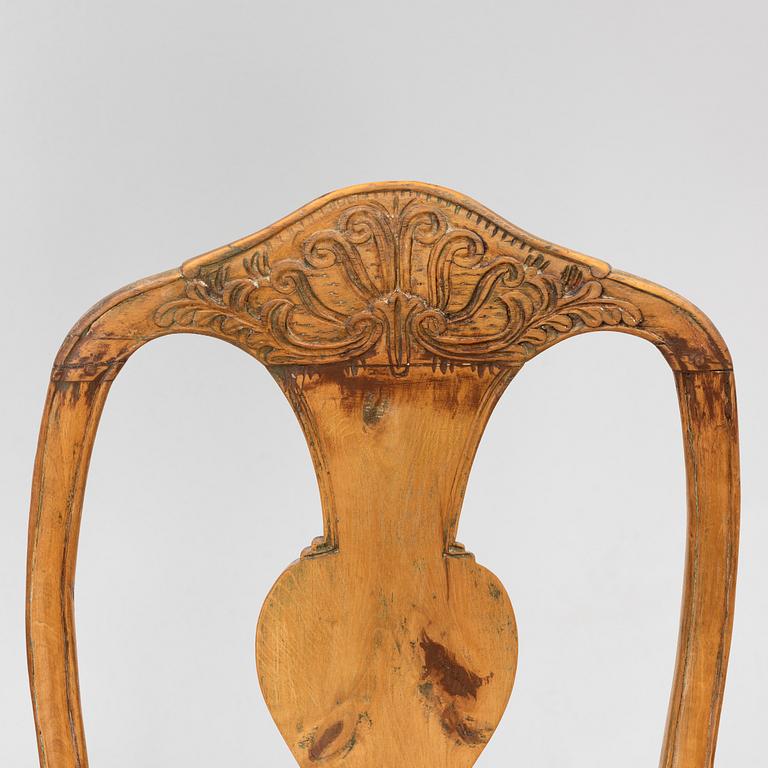 An assembled suite of ten rococo chairs, Western Sweden, later part 18th century.