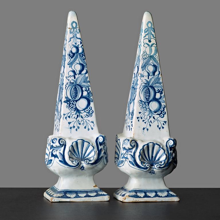 A pair of Swedish faience obelisques, Rörstrand, 18th Century, marked Stockholm.