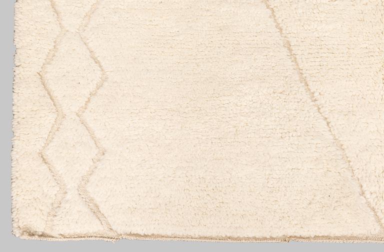 A moroccan carpet, ca 250 x 168 cm.