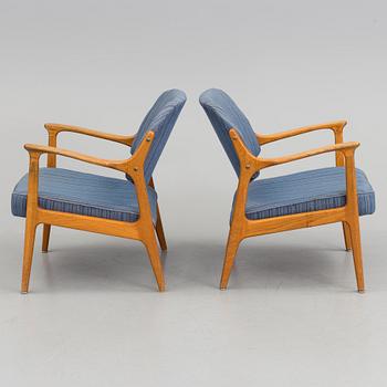 A pair of oak armchairs from Bröderna Andersson, mid 20th Century.