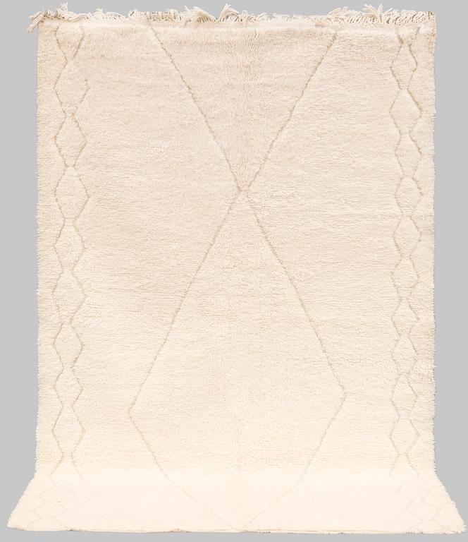A moroccan carpet, ca 250 x 168 cm.