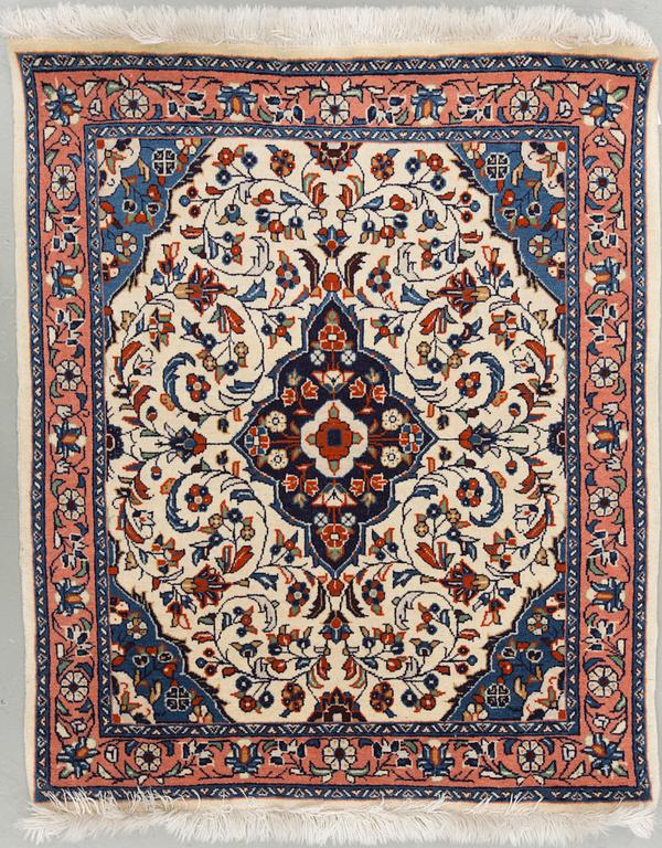 An old rug from Sarouk. Around 80 x 67 cm.