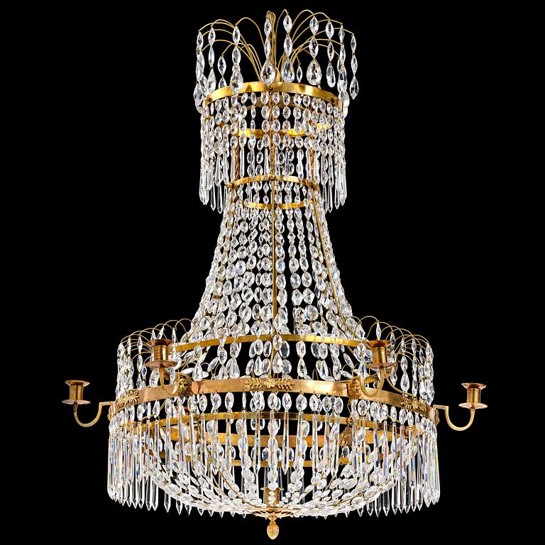 A late Gustavian gilt brass and cut glass seven-light chandelier, Stockholm, late 18th century.