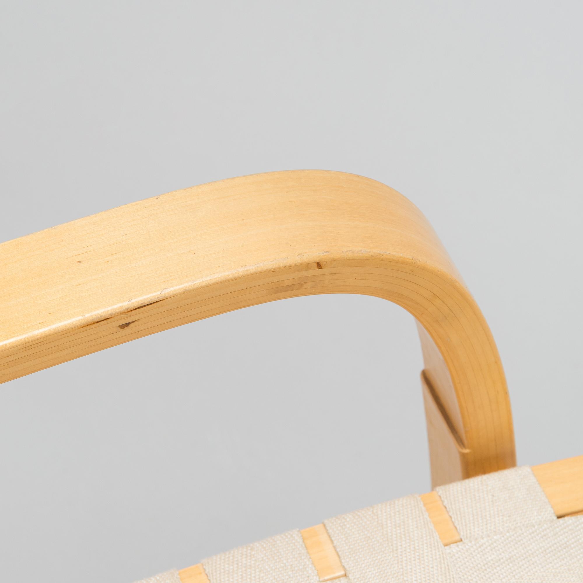 Alvar Aalto, a pair of late 20th century armchair model 406 Artek.