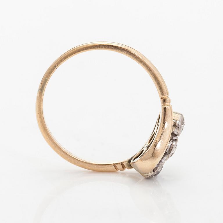 A 14K gold ring with old-cut diamonds.