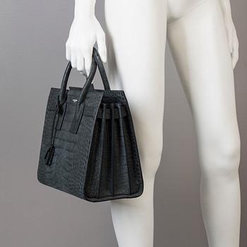 A bag by Yves Saint Laurent, "Sac du jour".