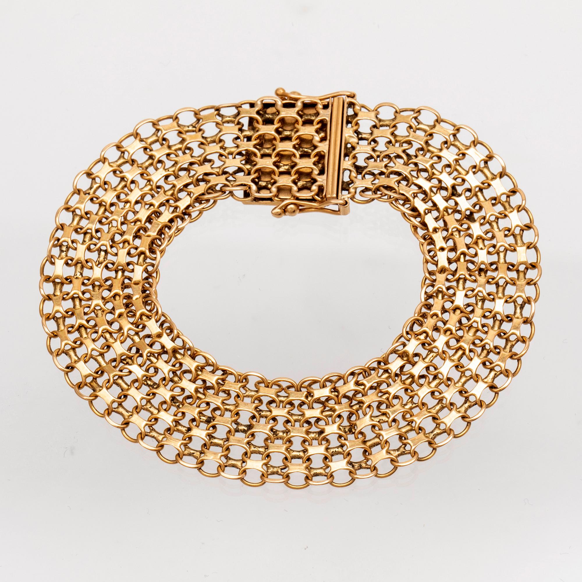Armband x-länk 18K guld. - Bukowskis