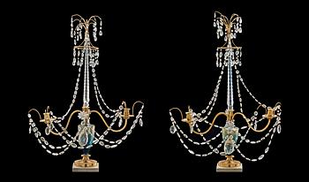 1263. A pair of gilt bronze and glass two-light girandoles, Russia 18th/19th century.