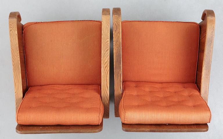 Axel Einar Hjorth, attributed, a pair of stained pine "Lovö" easy chairs, Nordiska Kompaniet, Sweden 1930's.