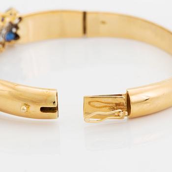 Sapphire and brilliant cut diamond bangle.