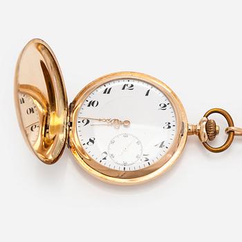 Fickur och ked, 51 mm. 14K guld, ankargång, plastglas.