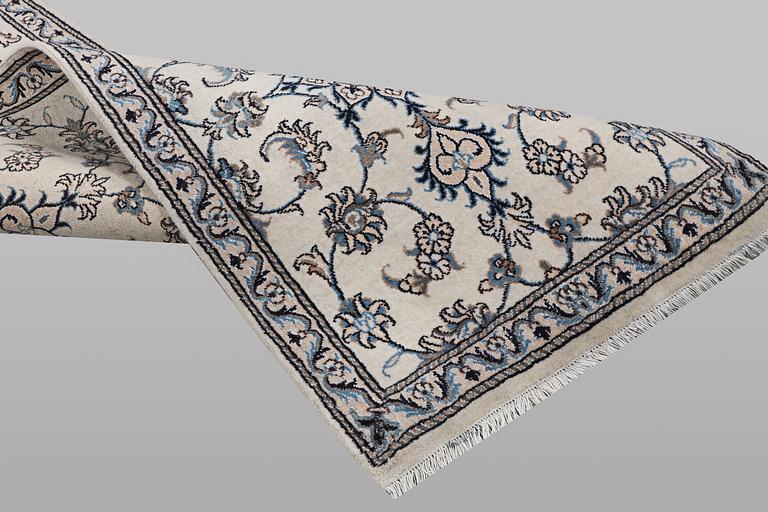 A runner carpet, Nain, part silk, ca 197 x 77 cm.